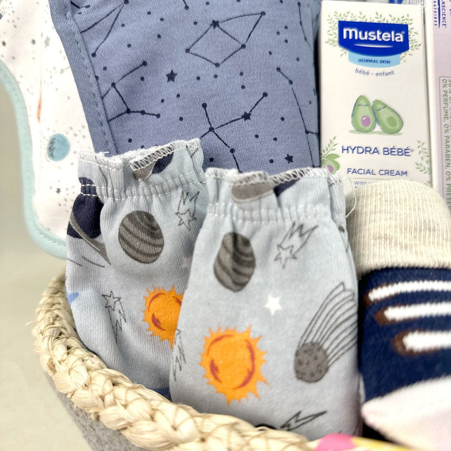 A basket filled with a BUNDLE OF BABY JOY diapers and wipes, perfect for a newborn baby gift from VWOWGIFTS.