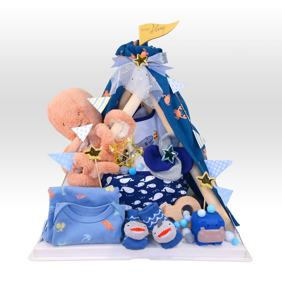 A VWOWGIFTS OCEAN BREEZE TENT BABY DIAPER CAKE hamper with teddy bears and toys.