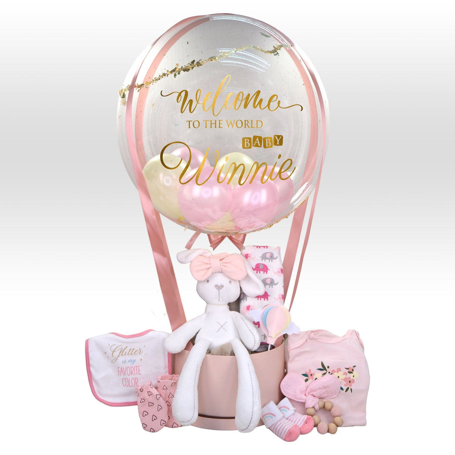 A VWOWGIFTS hot air balloon of love baby girl hamper with a teddy bear and a teddy bear for newborn baby gifts.