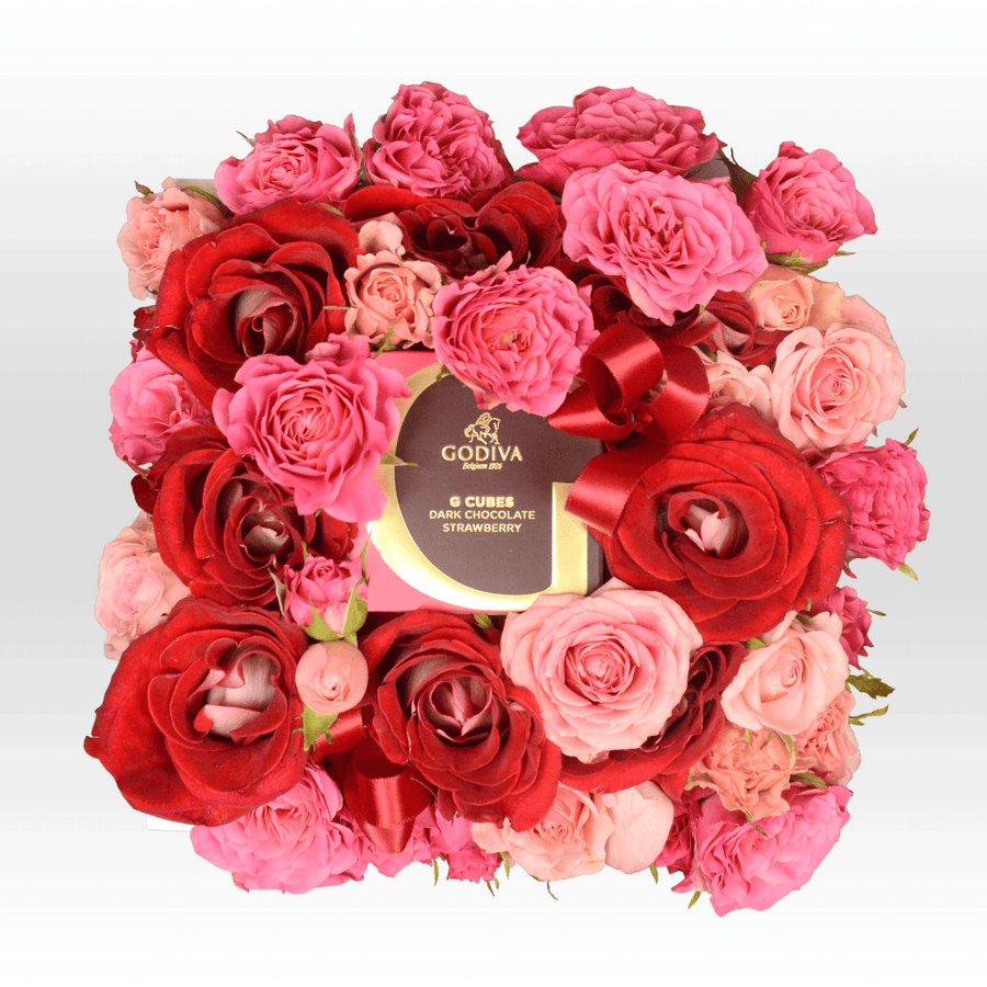 A bouquet of VWOWGIFTS ROSE DANCE BOX with a box of chocolate.