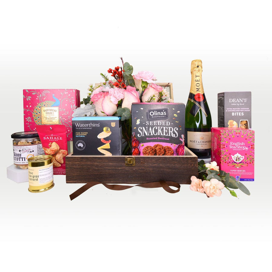 A VWOWGIFTS gift box filled with SAVORY SENSATION chocolates and champagne.