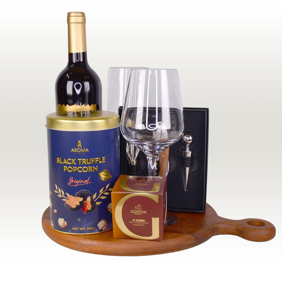 A TIMELESS INDULGENCE wine and chocolate hamper on a wooden tray by VWOWGIFTS.