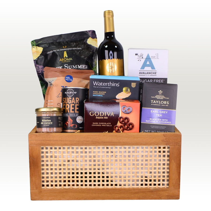 A wooden crate filled with VWOWGIFTS DELICIOUS TREATS GIFT HAMPER.