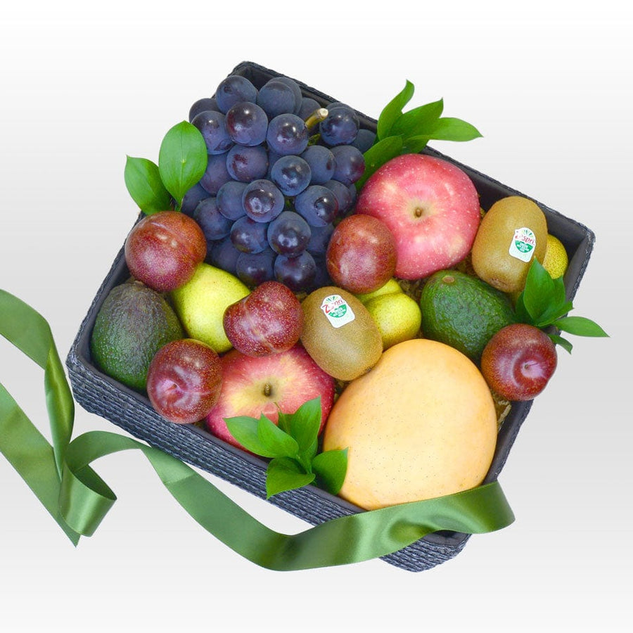 A black box filled with VWOWGIFTS' Orchard Treats Fruit Hamper.
