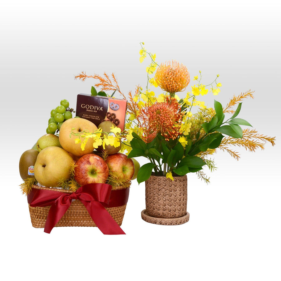 A VWOWGIFTS DELIGHTFUL SCENT Hamper filled with fruit and flowers.