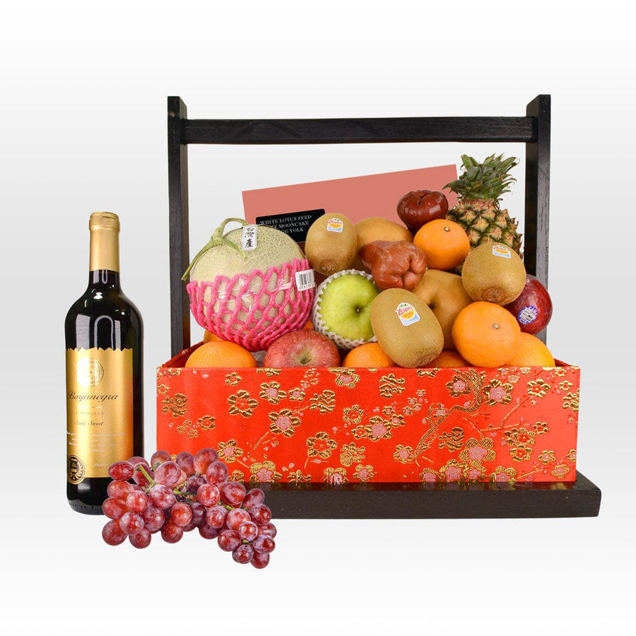 A basket of MOONLIT GATHERING MID-AUTUMN FRUIT WITH MOONCAKE and a bottle of wine from VWOWGIFTS.