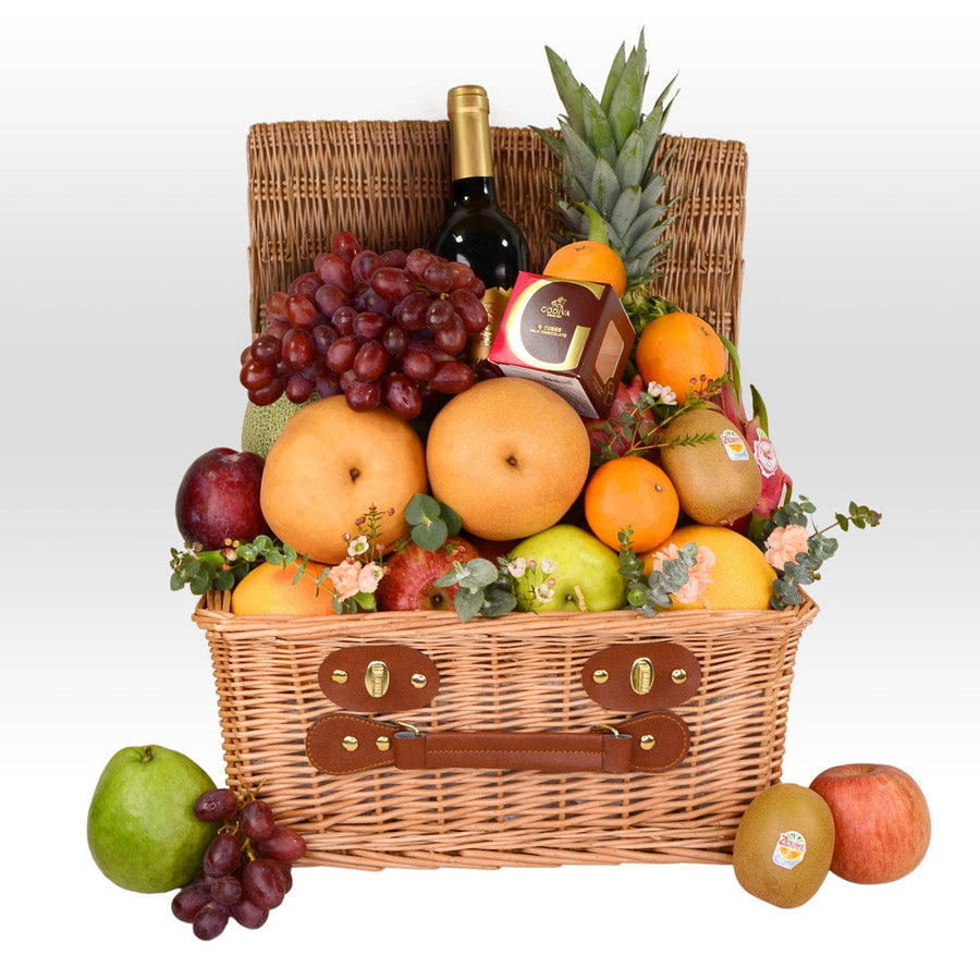A VWOWGIFTS wicker basket filled with FULL MOON BLESSINGS MID AUTUMN FRUIT HAMPER WITH MOONCAKE and a bottle of wine.