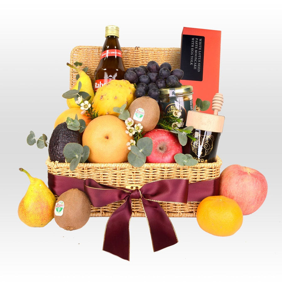 A VWOWGIFTS Sweet Reunions Mid-Autumn Fruit Hamper with Patisserie La Lune Mooncake filled with fruit and a bottle of wine.