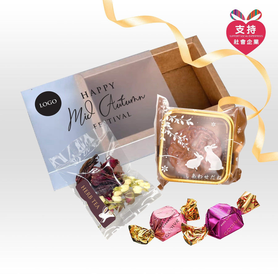 A VWOWGIFTS gift box with MOONLIT FEAST MID-AUTUMN FESTIVAL GIFT SET WITH ANGELCHILD MOONCAKE, chocolates, and a ribbon.