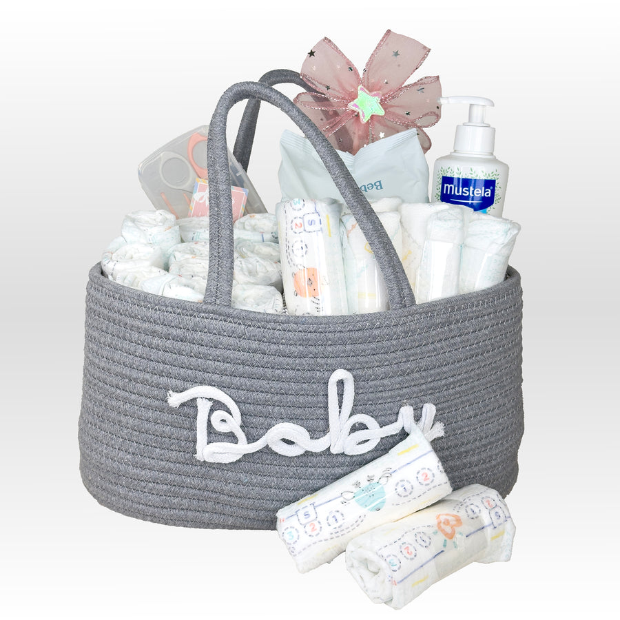 Gray 'Baby' basket filled with baby products on a white background