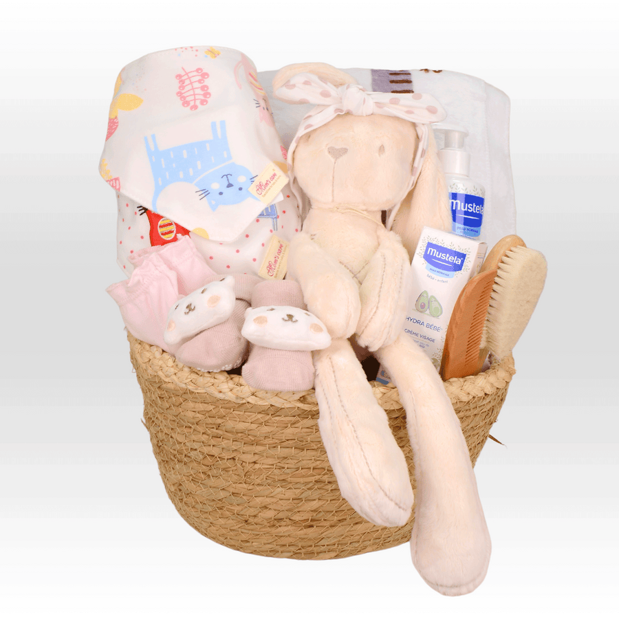 A VWOWGIFTS LUXURY BABY HAMPER with a teddy bear and other items.