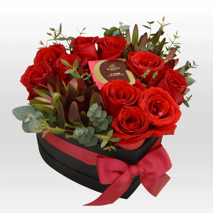 A black box filled with red roses and chocolate, the SWEETHEART by VWOWGIFTS.