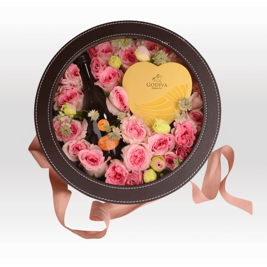 A SIMPLY LUXURY heart shaped box filled with roses and chocolate from VWOWGIFTS.