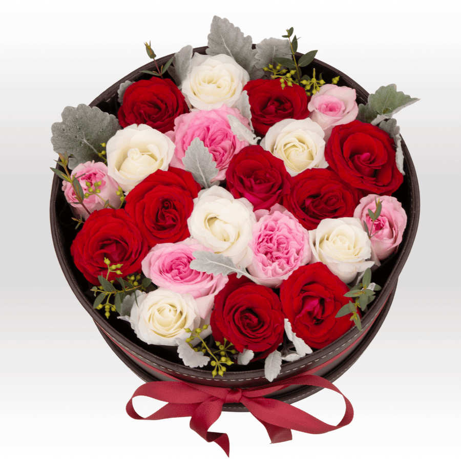 A VIVACIOUS FLOWER GIFT BOX from VWOWGIFTS, consisting of a bouquet of roses in a black box.