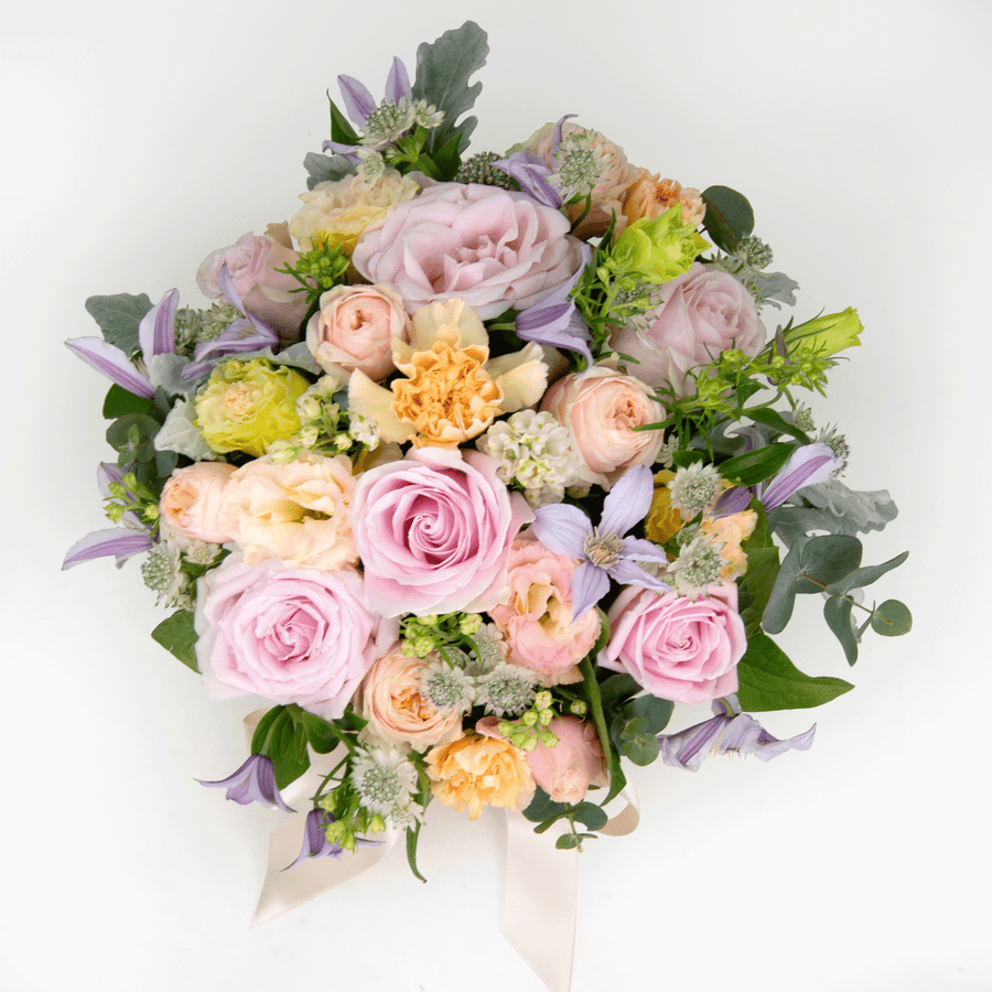A bouquet of MAGIC HOUR pink and white flowers on a white background by VWOWGIFTS.