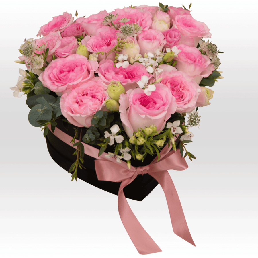 A bouquet of PASTEL LOVE pink roses in a black box from VWOWGIFTS.