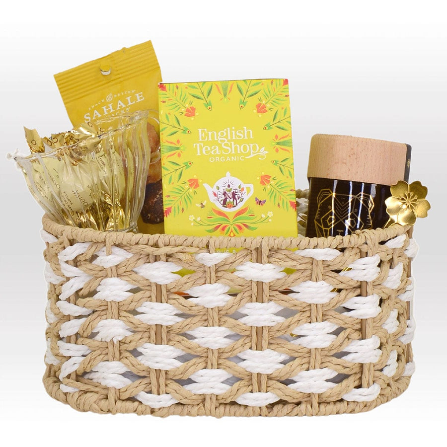 A VWOWGIFTS DELIGHTFUL TREAT basket with a variety of items in it.