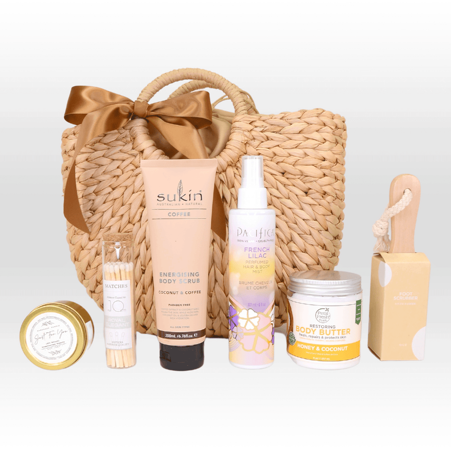 A wicker basket with a variety of VWOWGIFTS Luxury Bath Experience products.