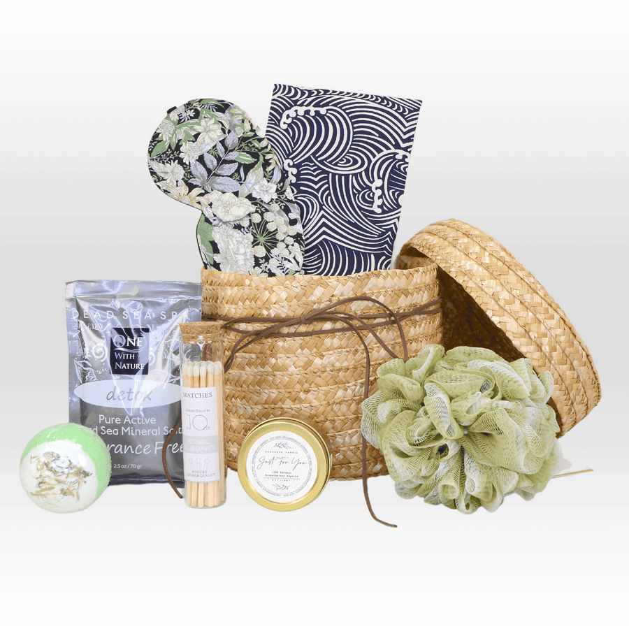 A VWOWGIFTS wicker basket with THE ENERGETIC PAMPER in it.