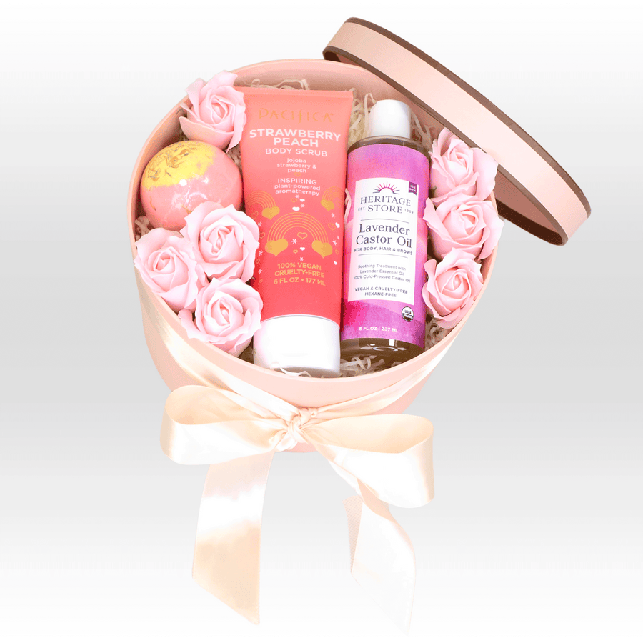 A pink box filled with roses and the VWOWGIFTS SELF CARE HAVEN GIFT SET.