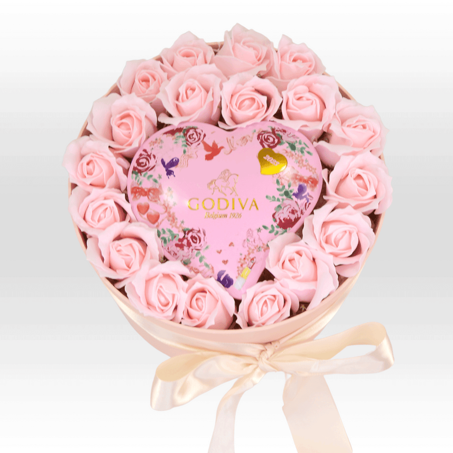 Pink roses in a heart shaped box of SWEET SURPRISES by VWOWGIFTS.