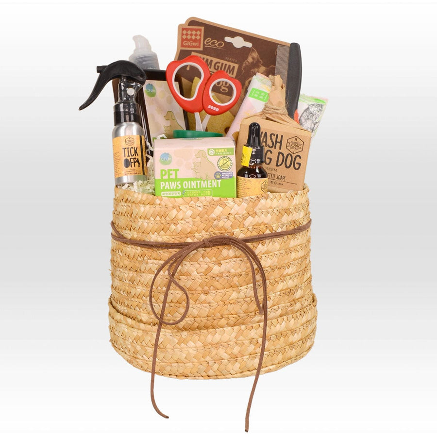 A wicker basket filled with POOCH PAMPERING cleaning supplies from VWOWGIFTS.