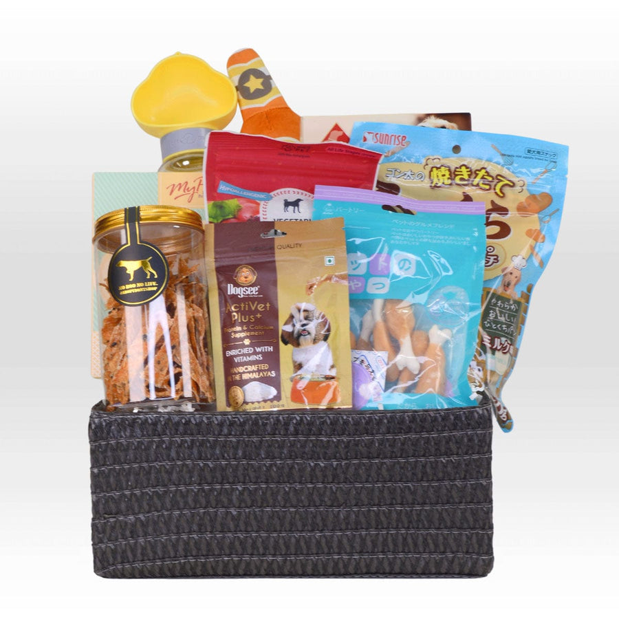 A VWOWGIFTS POOCH TREASURE CHEST filled with dog treats and snacks.